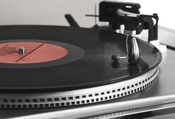 Enjoy the warm tones and nostalgia of vinyl records while using a sleek hearing aid that enhances...