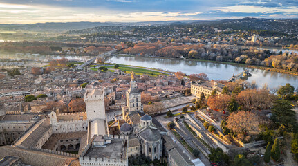 Panoramic sunset view of Avignon old town with Palais des Papes and Rhone River, France – historic cityscape, medieval architecture, cultural heritage and travel destination