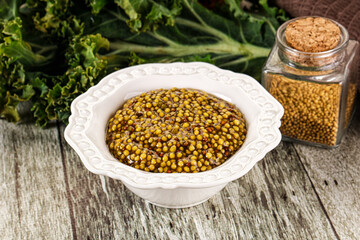 Mustard sauce with seeds in the bowl