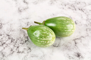 Ripe green mini eggplants heap