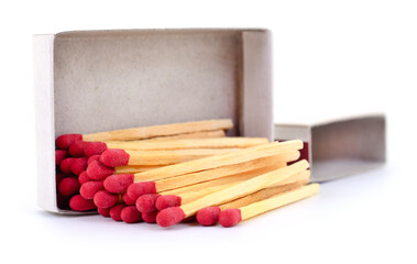 Matches spilling from open matchbox