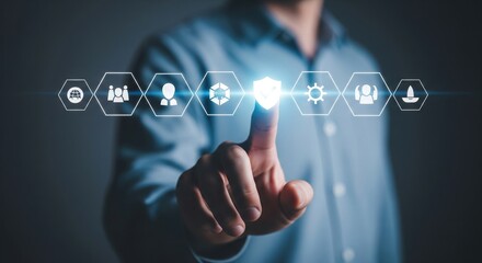 Person touching glowing digital icons representing technology and business concepts