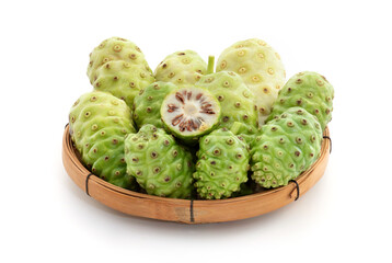 Noni or Morinda citrifolia fruits isolated on white background.