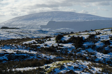 A snow covered Knocklayd Mountain in County Antrim, Northern Ireland 