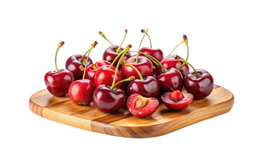 Fresh red cherries piled on a wooden cutting board, isolated on white