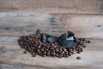 Coffee beans on a wooden background