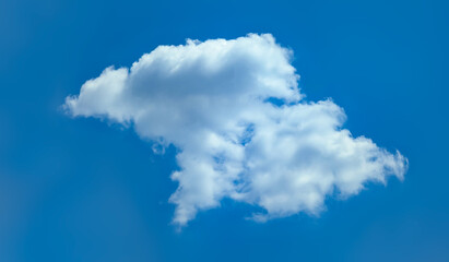 A small round cloud moves across the clear blue sky. The path of the rain is from left to right.. White hat cloud dreaming in your imagination