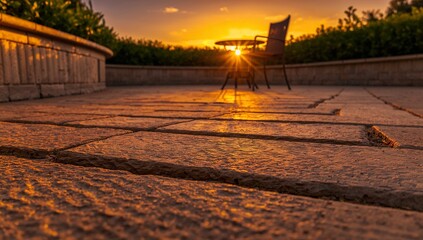 Sunset patio outdoor background with stone pavers and peaceful garden view