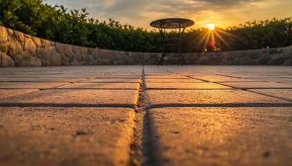 Patio sunset outdoor scene with stone pavers and sunlight landscape view