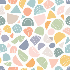 Abstract seamless pattern in pastel colors with geometric shapes: circles, triangles, arches, flowers. Light modern design for textiles and decor