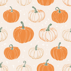 Seamless autumn pattern with orange pumpkins, green leaves, and decorative dots. Cozy seasonal design perfect for fall, Thanksgiving, and harvest themes