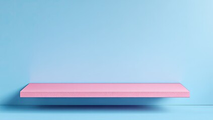 Empty light pink shelf against a light blue wall