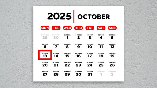 The date October 13th marked with a red cursor on the wall calendar 2025