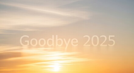 Warm sunset sky welcomes new beginnings, fading year goodbye 2025
