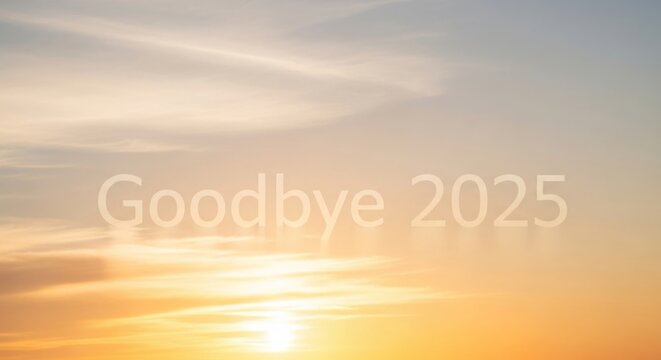 Warm sunset sky welcomes new beginnings, fading year goodbye 2025