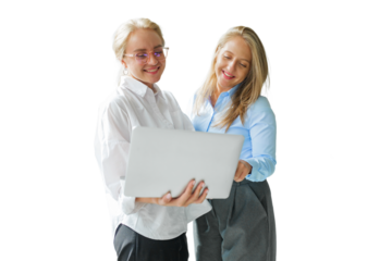 Two businesswomen engaged in a collaborative meeting while discussing ideas using a laptop