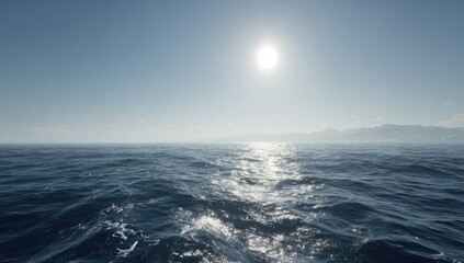 Fototapeta premium Vast ocean stretches to a hazy horizon under a bright sun