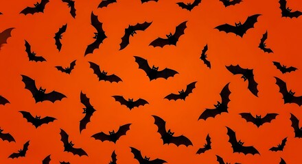 Fototapeta premium A festive halloween background featuring a seamless pattern of black bat silhouettes on a vibrant orange backdrop, perfect for adding a spooky touch to your designs