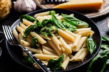Delicious Penne Pasta with Pesto, Fresh Basil, and Parmesan Cheese
