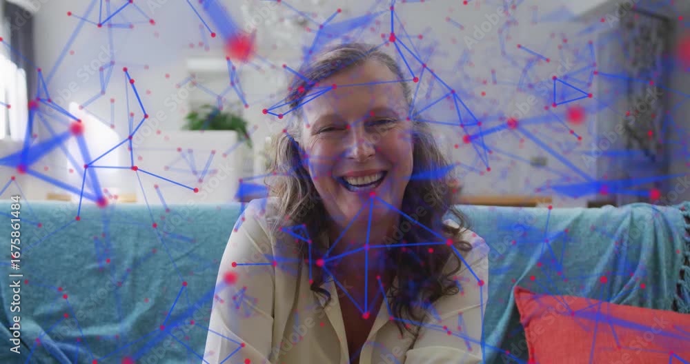 Poster woman smiling at camera on sofa, causing network lines and nodes materializing for technology demo