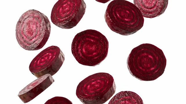 Roasted Beet Slices Falling on White - Multiple slices of roasted beets are shown falling against a white background. The beets are dark red and appear to be cooked.