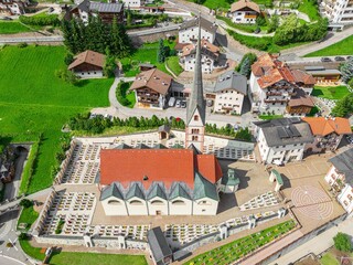 Aerial view of church and cemetery grounds in Santa Cristina Valgardena. South Tyrol, Italy