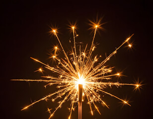 Single Glowing Sparkler Burning in Darkness