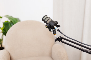 Interview setup with a microphone ready for discussion in a cozy room