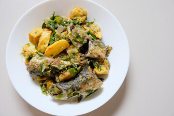 Indonesian homemade food, fried fish with green chili or sambal ijo