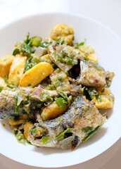 Indonesian homemade food, fried fish with green chili or sambal ijo