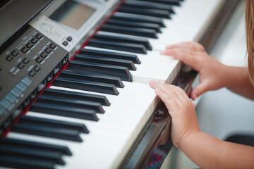 child playing piano