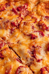 Freshly baked pizza with golden crust, melted cheese, and assorted toppings. Hot and delicious Italian dish served straight from the oven