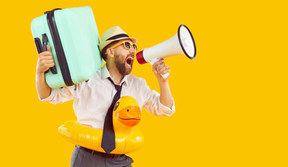 Funny man in office shirt, tie, hat, sunglasses, rubber duck beach ring holding travel suitcase and...