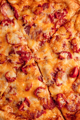 Freshly baked pizza with golden crust, melted cheese, and assorted toppings. Hot and delicious...