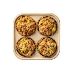 Overhead Shot of Four Delicious Zucchini Crumble Muffins in a Baking Tin