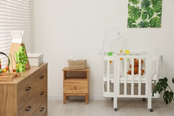 Baby's room with crib and toys. Interior design