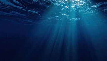 Sunlight beams through dark ocean depths
