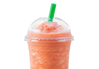 Refreshing pink strawberry smoothie with green straw in clear plastic cup isolated on transparent background