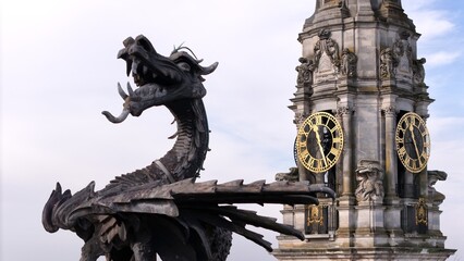 Fototapeta premium Cardiff dragon on the council building with clock in background