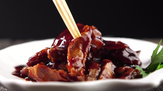 Peking duck fillet in sauce.Asian food. Chinese cuisine