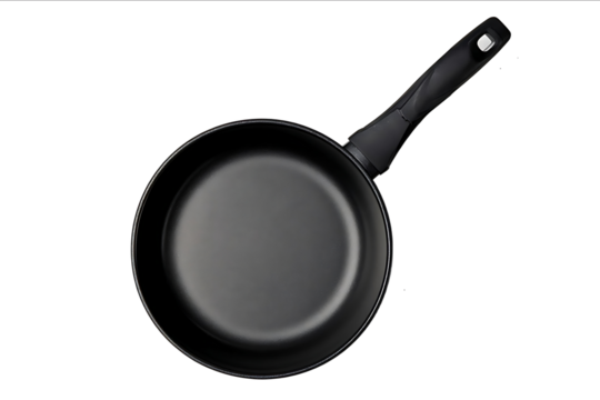 Black pan isolated on a white background top view closeup