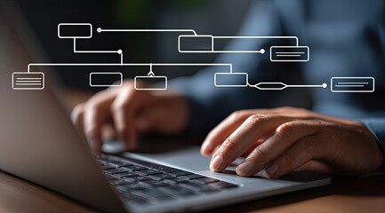 Person using laptop with flowchart overlay