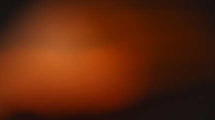 Abstract gradient background in warm orange, red, and dark tones with smooth blend. Banners and...
