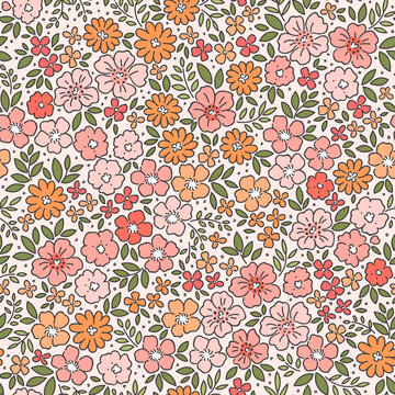 Vintage seamless floral pattern. Ditsy style background of small flowers. Small blooming orange and colar flowers scattered over a ivory background. Stock vector liberty vintage floral cute print  