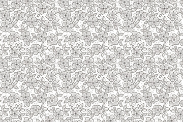 Vector seamless pattern. Vintage pattern in small abstract daisy flowers. Small black flowers. White background. Liberty floral background. Trendy hand drawn template for fashion prints. Stock print
