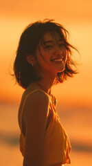 A young woman beams with radiant joy during a serene sunset. She turns toward the golden hues, embracing the tranquil atmosphere.