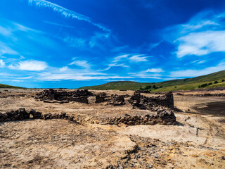 Scar House reservoir in Nidderdale, North Yorkshire - in low water. Buildings are now visible above the low waterline.