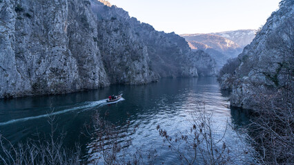 Matka Macedonia - A Calm river between high rocky cliffs in winter.