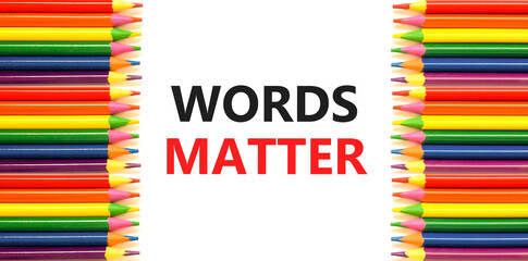 Words matter symbol. Concept word Words matter on beautiful white paper. Colored pencils. Beautiful...