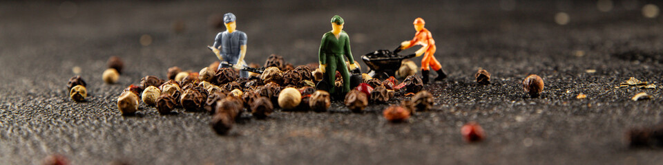 Miniature workers seasoning pepper pea spice tasty snack fresh delicious gourmet food background on the table rustic top view copy space